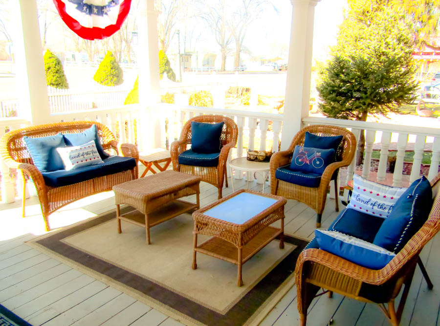 porch with wicker seating.